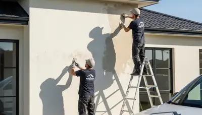 Stucco repair specialists restoring coastal home exterior in Clearwater, FL
